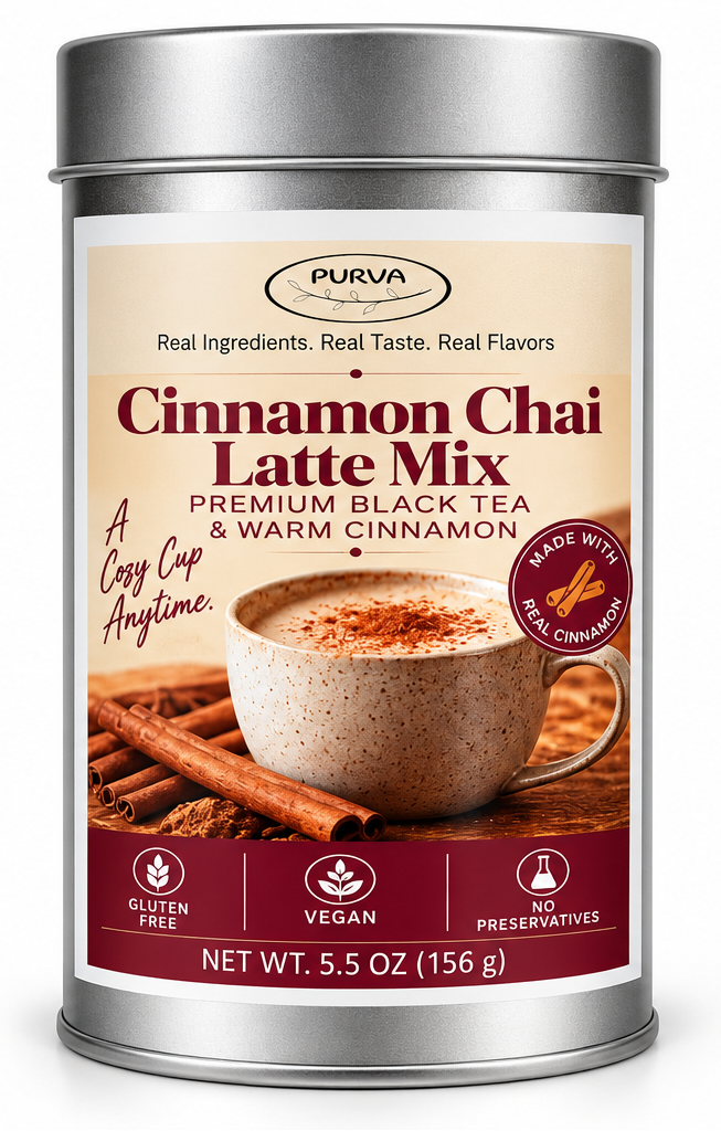 Silver metal canister of Purva's Cinnamon Chai Latte Mix on a white background, displaying the front label with a cup of chai tea. 