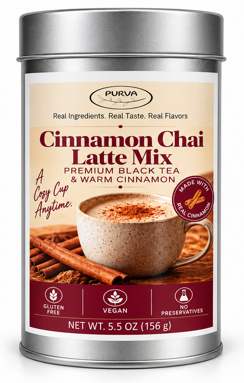 Silver metal canister of Purva's Cinnamon Chai Latte Mix on a white background, displaying the front label with a cup of chai tea. 
